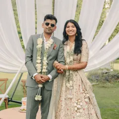 A beautiful moment from a client's wedding reception. The groom's sage green suit, crafted from a fine merino wool blend, offers a modern yet timeless elegance that feels both sophisticated and completely natural for such a special day.