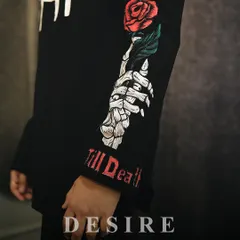 Art in every stitch. This close-up shows the hand-painted skeleton hand and rose on the sleeve of my AK-47 shirt, complete with 'Till Death' embroidery on the cuff.