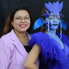 A happy moment with my model after completing the blue fantasy makeup. Our academy is a creative and supportive environment.