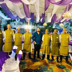 Our founder with the service team at a private celebration. We take pride in our hands-on approach and the dedication of our staff, who are the backbone of our success.