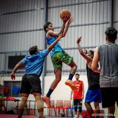 It's about giving players the confidence to take flight. An action shot from one of our pickup games, where players apply their skills in a fast-paced, competitive environment.