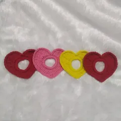 These heart-shaped scrunchies are a fun and trendy accessory. Available in a variety of colors like red, pink, and yellow, they are perfect for Valentine's Day or any day you want to share a little love.