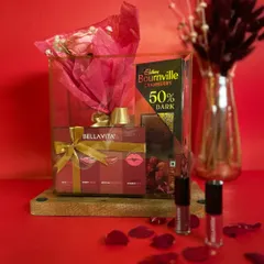 The 'Elegant Bloom' hamper is all about classic romance. It includes a forever rose, a set of Bella Vita lipsticks, and cranberry dark chocolate, beautifully arranged for a lasting impression.