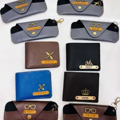 It's all in the details. I offer a range of personalized accessories like these wallets and spectacle cases. You can add a name and a special charm to make it a truly one-of-a-kind gift for him.