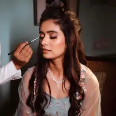The artist at work. A quiet moment of focus as I apply the eyeshadow for this soft and elegant party look.