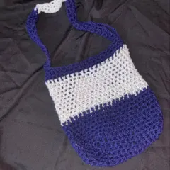 My handmade mesh bag in blue and white. The open stitch makes it super lightweight and perfect for summer.