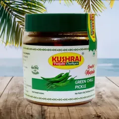 This is my Green Chilli Pickle, a perfect blend of spice and tang. The product shot shows the clean packaging and the promise of a homemade taste.
