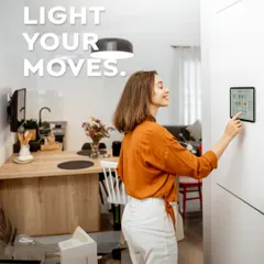 Smart lighting adds both convenience and efficiency. Here, a user adjusts the lighting from a wall-mounted touch panel. I install systems with motion sensors that illuminate your path and save energy by turning off lights when a room is empty.