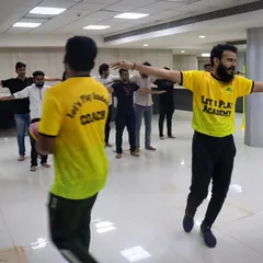 We bring the energy right to your office. Here, our coach leads a corporate wellness session with employees from IDBI Intech, focusing on simple, effective exercises to boost team morale and break up the workday.
