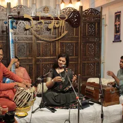 The artists in conversation through their music. The smiles and gestures exchanged between the vocalist, tabla player, and harmonium player are as much a part of the performance as the notes themselves.