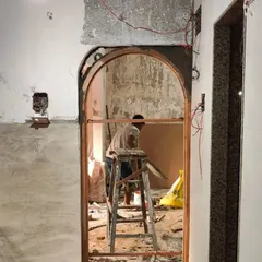 Every space is unique, and so is every design. This photo from a work-in-progress site shows the creation of a custom archway. Arches are a wonderful way to add softness and character to an interior space.