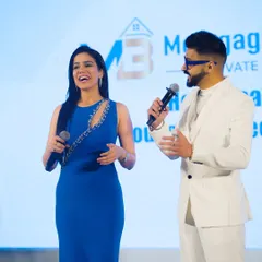 Sharing a laugh with my co-host on stage. Even in a corporate setting, a little humour goes a long way in keeping the energy up.