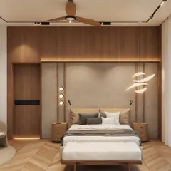 This bedroom design combines a wood-paneled feature wall with a textured headboard and sculptural lighting. The herringbone wood flooring adds another layer of pattern and warmth to the space.
