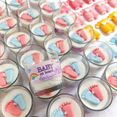 A closer look at the adorable baby feet votive candles, a popular choice for baby showers and birth announcements. Each one is a sweet, memorable keepsake.