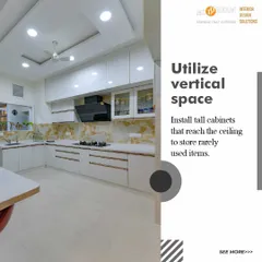 To maximize storage in this kitchen, we installed tall cabinets that reach the ceiling. This is a perfect spot for storing rarely used items, keeping the main countertops free of clutter.