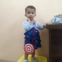She loves posing with her little bag. It brings me so much happiness to see her enjoy something I made with my own hands.