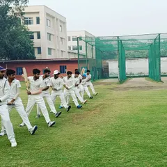 A group of young players practicing their batting stance in unison. We teach the fundamentals through shadow drills to build muscle memory and perfect form.