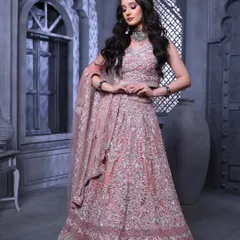 A full-length shot from our campaign, showcasing the beautiful lehenga and the complementary makeup. The look is glamorous and aspirational.