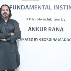 Standing with my work at the opening of my solo exhibition. Each show is the culmination of months, sometimes years, of work and introspection.