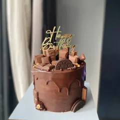 A tall Chocolate Overload cake for a big celebration. This 1kg Chocolate Mousse cake is made with couverture chocolate for an extra rich and decadent flavor.