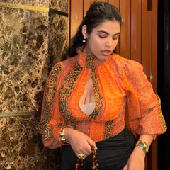 A closer look at the thrifted top. The high neck and keyhole detail are so unique. Thrifting is a great way to find one-of-a-kind items.