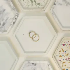Did you know you can use our hexagonal trinkets to keep your daily jewelry safe? They are available in terrazzo and marbled finishes.