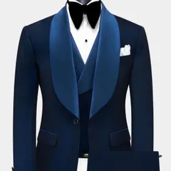 A navy blue tuxedo with a wide shawl lapel. This is a very elegant and classic style for any black-tie event.