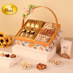 This is one of my classic hamper baskets, perfect for any occasion. It’s a beautiful mix of my signature baklava, fusion sweets, and premium dry fruits like cashews and almonds, all arranged in a floral-themed basket that feels like a celebration in itself.