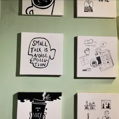 More of the black and white custom art from the Sidewalk Cafe installation. Each 12 by 13 inch canvas features a unique design related to cafe culture.