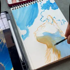 The beginning of the watercolor cat portrait. I use a reference photo on my tablet and start by blocking in the main colors.