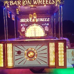 Meet our 'Bar On Wheels', a fully equipped mobile bar that brings the complete premium cocktail experience anywhere. It's perfect for outdoor events, festivals, and weddings, designed to be a spectacle in itself.