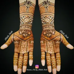 This is another example of a Tapasvi mehendi, designed for someone undertaking religious austerities. The pattern is dense and traditional, featuring lotus motifs at the wrist, symbolizing purity and enlightenment.