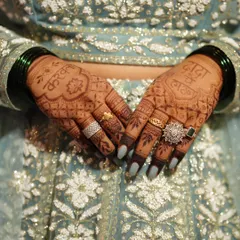 The final stain tells the real story. This is the rich, dark color my client got for her brother's wedding, achieved with my all-natural henna paste. The design includes 'Dada' and 'Vahini' to celebrate the new couple.