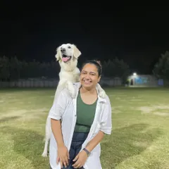 Hello! Your friendly neighborhood canine trainer here. Just a quick hello from me and a happy Golden Retriever, doing what we love most. I'm based in Noida and ready to help you with your dog.