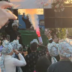 The party is in full swing with colored smoke flares adding to the excitement. This is how we make a baraat an epic celebration before even reaching the venue.