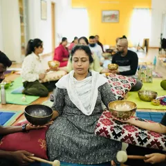 In my training, learning is a shared experience. Here, students practice singing bowl techniques on one another, feeling the vibrations and understanding the healing process from both sides.