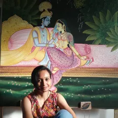 Here I am with the completed 4x4 ft Pichwai painting of Radha and Krishna. It's always a special feeling to sit with a finished piece that carries so much tradition and story.