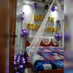 This view shows the 'Happy Birthday' foil letters on the wall, completing the surprise room decoration.