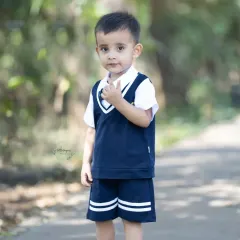 A quiet moment of contemplation during an outdoor shoot. Even when they are not smiling, a child's innocent expression tells a beautiful story.