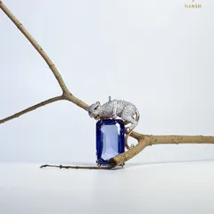 An emerald cut sapphire held by a panther in pavé diamonds. This pendant from my Whispers of the Earth collection celebrates untamed strength and timeless beauty.