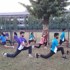 A proper warm-up and cool-down are non-negotiable. Our athletes perform guided stretches like lunges to improve flexibility and aid muscle recovery.