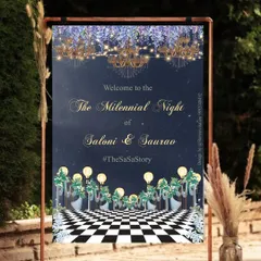 A welcome sign designed for 'The Millennial Night' of Saloni and Saurav. The design features a dramatic starry sky, glamorous chandeliers, and a checkerboard floor, perfectly setting the mood for a chic and modern cocktail party.
