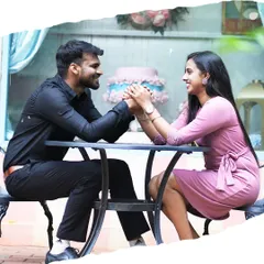 A sweet moment from a pre-wedding shoot at a cafe. This photo captures the couple's connection in a relaxed, everyday setting.
