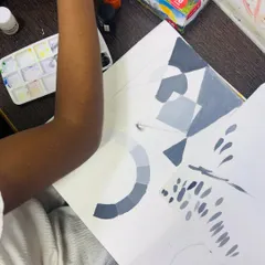 Another view of our tonal study practice. Students create color wheels and swatches in grayscale to master the control of paint and water for creating consistent tones.