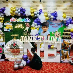 We bring popular cartoons to life with our fully themed party setups. This Cocomelon birthday party features a complete stage with character cutouts, a vibrant balloon arch, and large light-up letters spelling 'ONE' for a picture-perfect first birthday celebration.