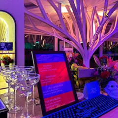 The bar we designed for the launch of Don Julio tequila. The setup featured a custom backlit menu and vibrant floral arrangements to complement the brand's aesthetic and create an immersive experience.