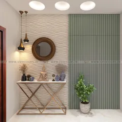 This captivating foyer design features a chic console table set against a 3D charcoal panel wall. We used PVC rafters to cleverly conceal a hidden door, adding an element of surprise and sophistication.