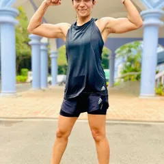 Flexing with pride. This photo captures my strength and determination, qualities that I've built through years of consistent training and hard work.