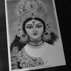 The sketch is almost complete here, with just the final shading on the saree and lower ornaments left. This stage shows the balance between the detailed and unfinished parts of the artwork.