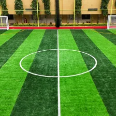 A clean, green, and perfectly lined football turf waiting for the game to begin. This ground-level view shows the quality and care we put into our facilities, ensuring a great experience every time.